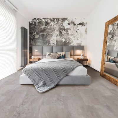 LVT grey flooring in a modern minimalist bedroom