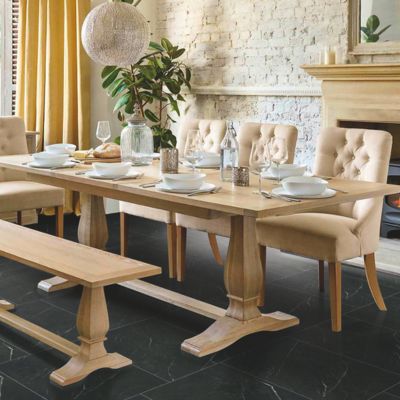 dark grey tile flooring in a stylish Melbourne, FL, dining room