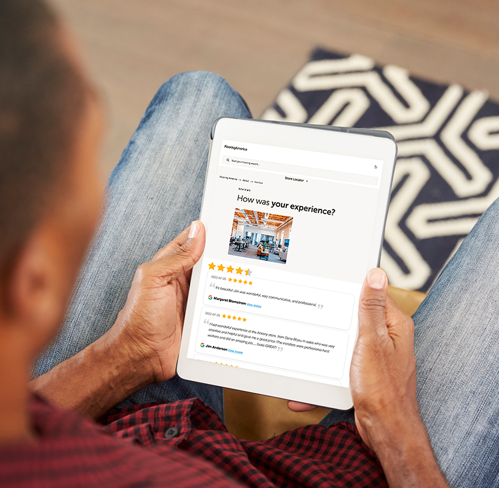 customer looking at the reviews for our flooring store